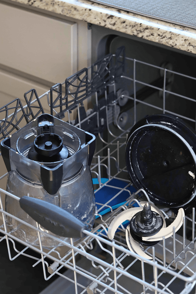 Ninja Food processor, blade assemblies and lid on the top rack of a dishwasher