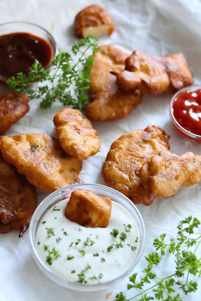 Sourdough Chicken Tenders with ranch, bbq, ketchup and parsley
