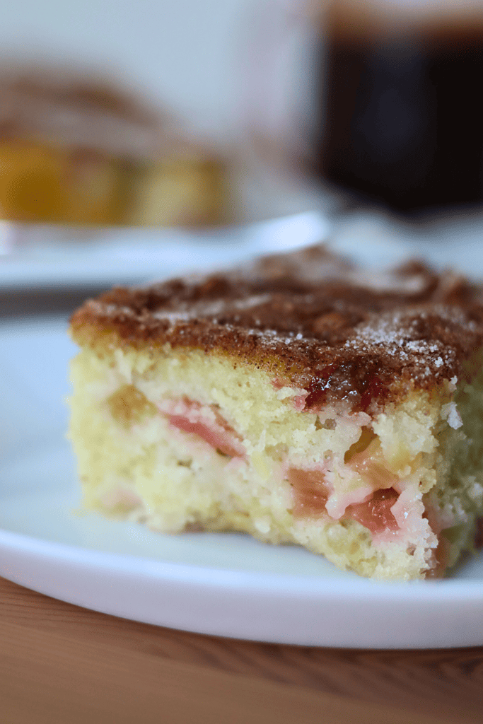 a slices of sourdough rhubarb cake on a plate