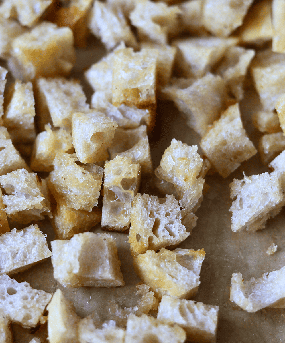 sourdough croutons on parchment paper