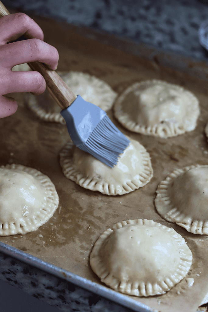 brush an egg wash on top of the sourdough hand pies
