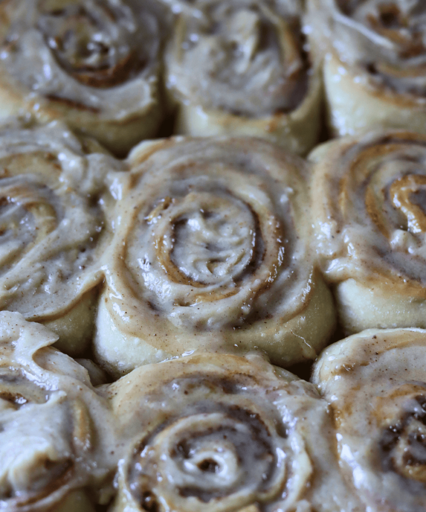 frosted Apple Cider Sourdough Cinnamon Rolls