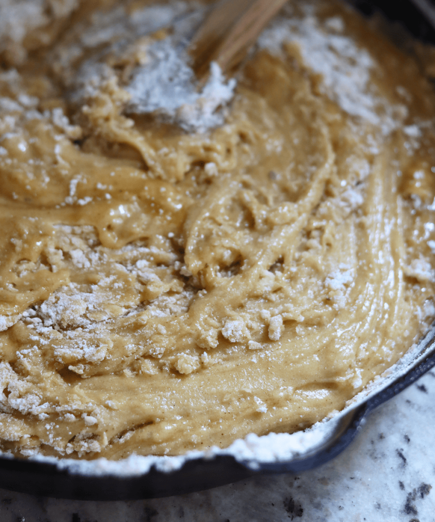 stirring in the dry ingredients with a wooden spoon