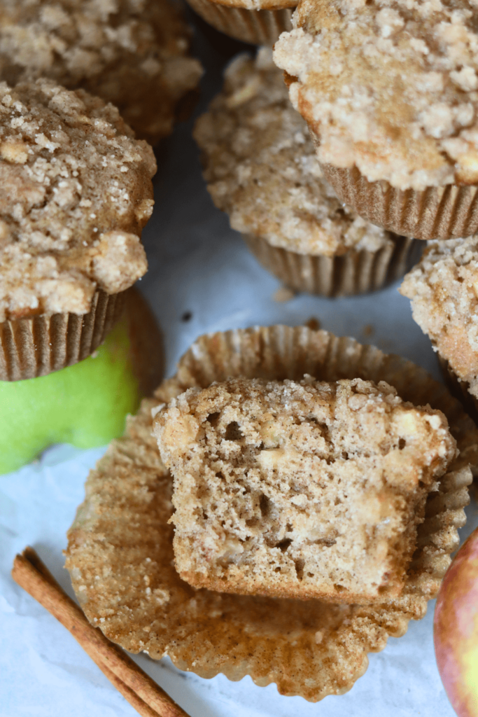 Sourdough Apple Cinnamon Muffins with a bite out of it