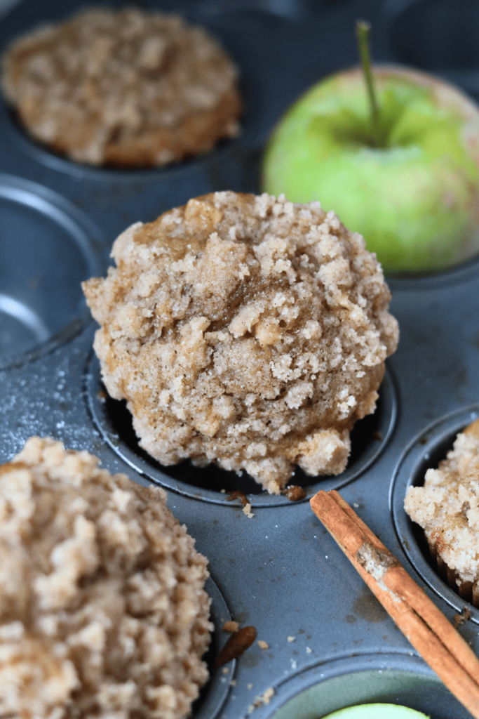 Sourdough Apple Cinnamon Muffins in a muffin tin