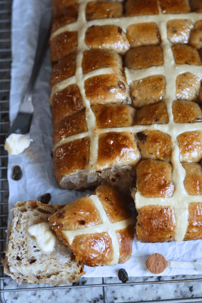 Sourdough Hot Cross Buns on a wire rack