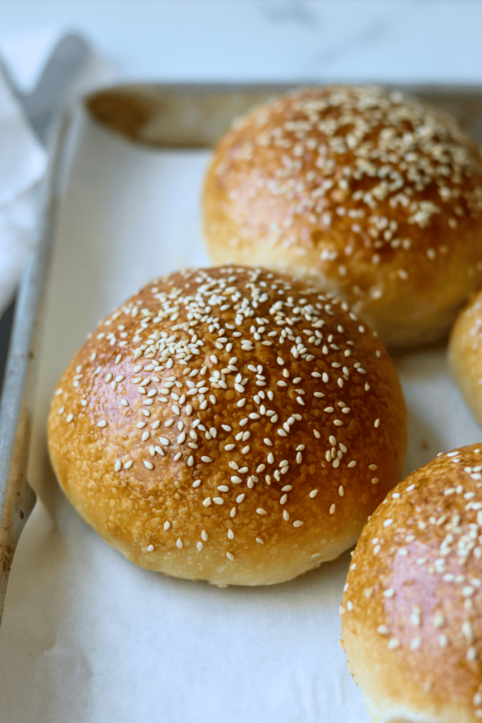 baked sourdough Burger Buns with sesame seeds