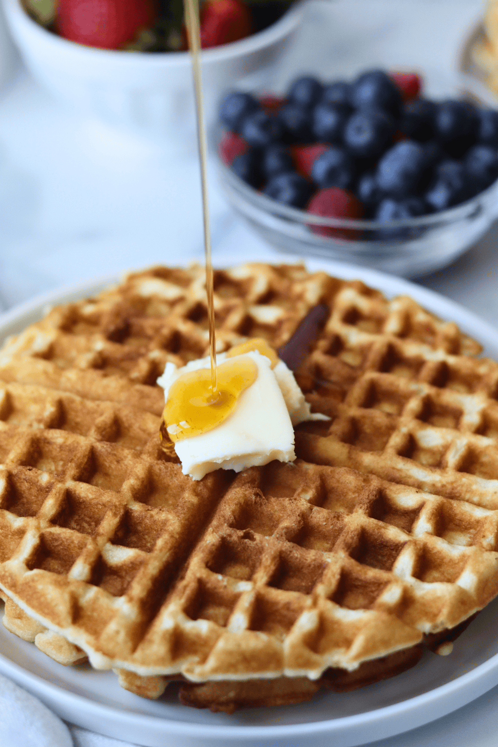 Sourdough Waffles with butter and maple syrup