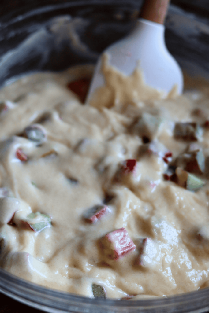 slices of rhubarb in the bread batter