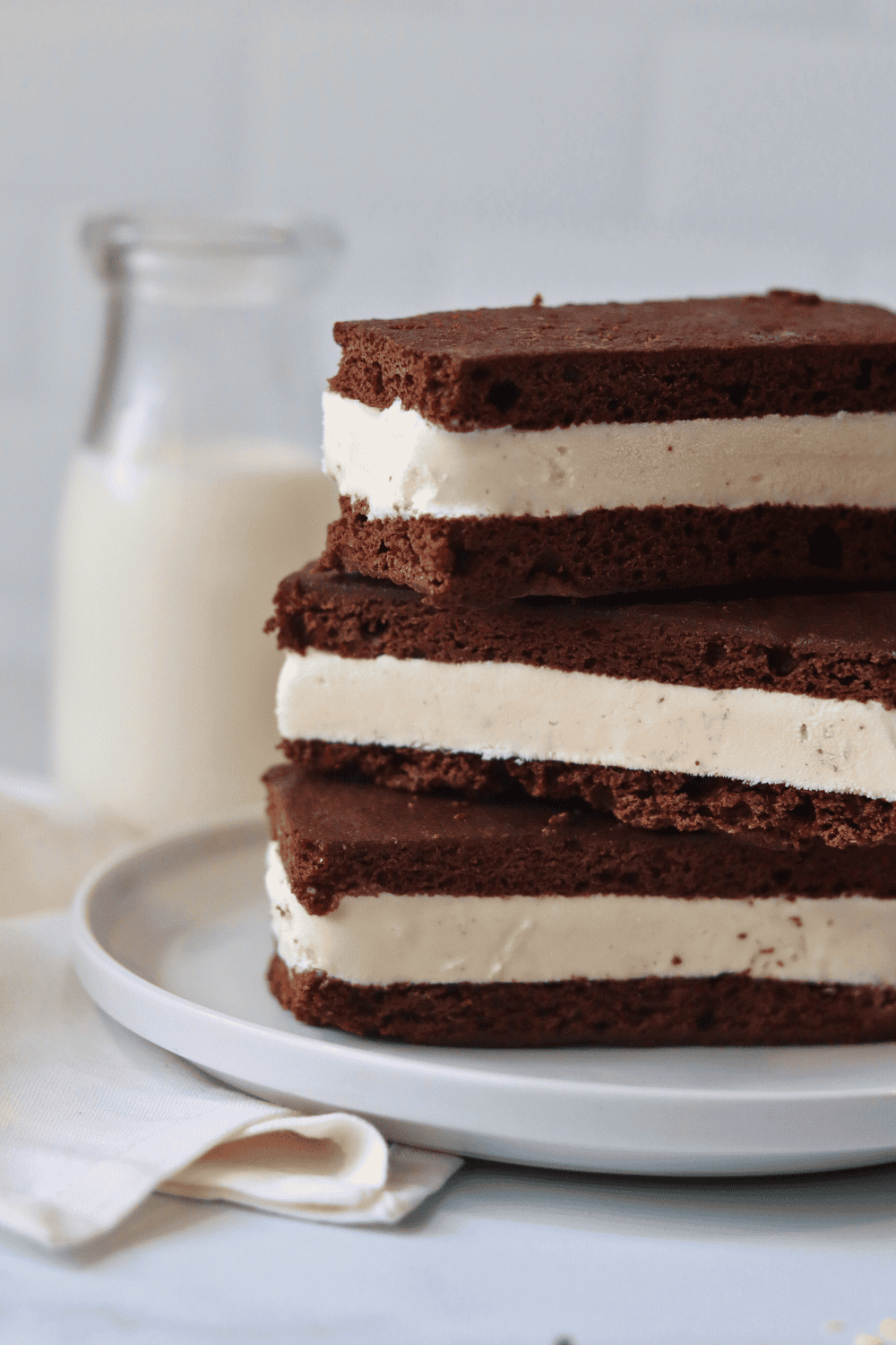 three sourdough ice cream sandwiches stacked on top of one another