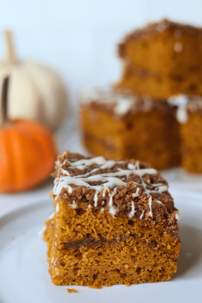 sliced sourdough pumpkin coffee cake on a plate