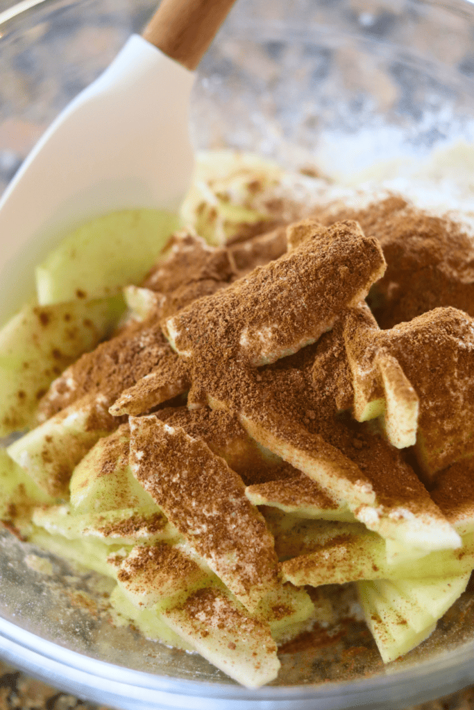 sliced apple with cinnamon sugar mixture