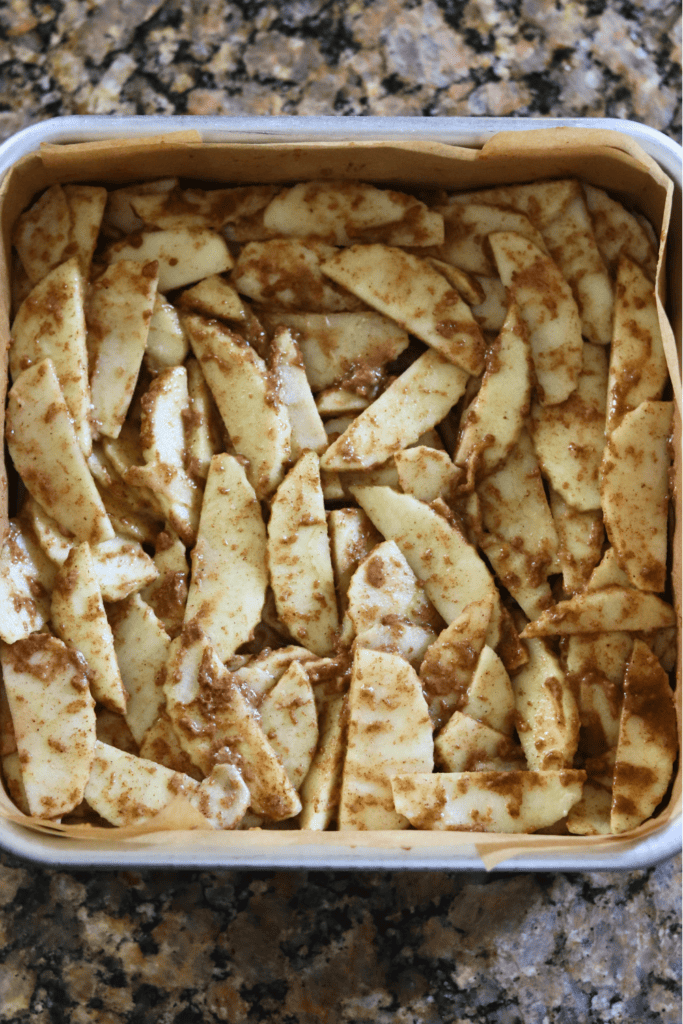 adding the apple filling to the crust