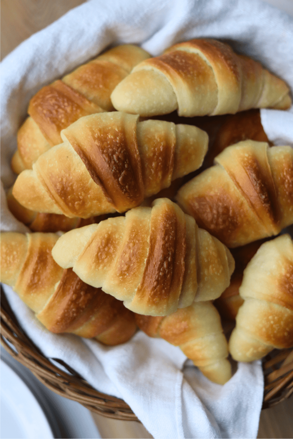 sourdough crescent rolls in a basket