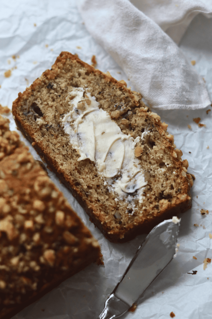 slice of buttered sourdough banana bread