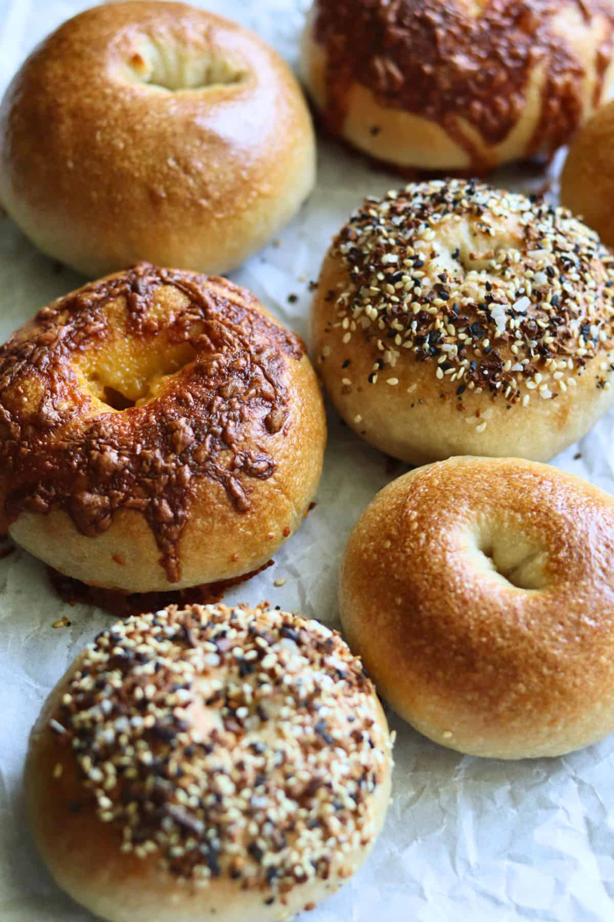 sourdough bagels on parchment paper