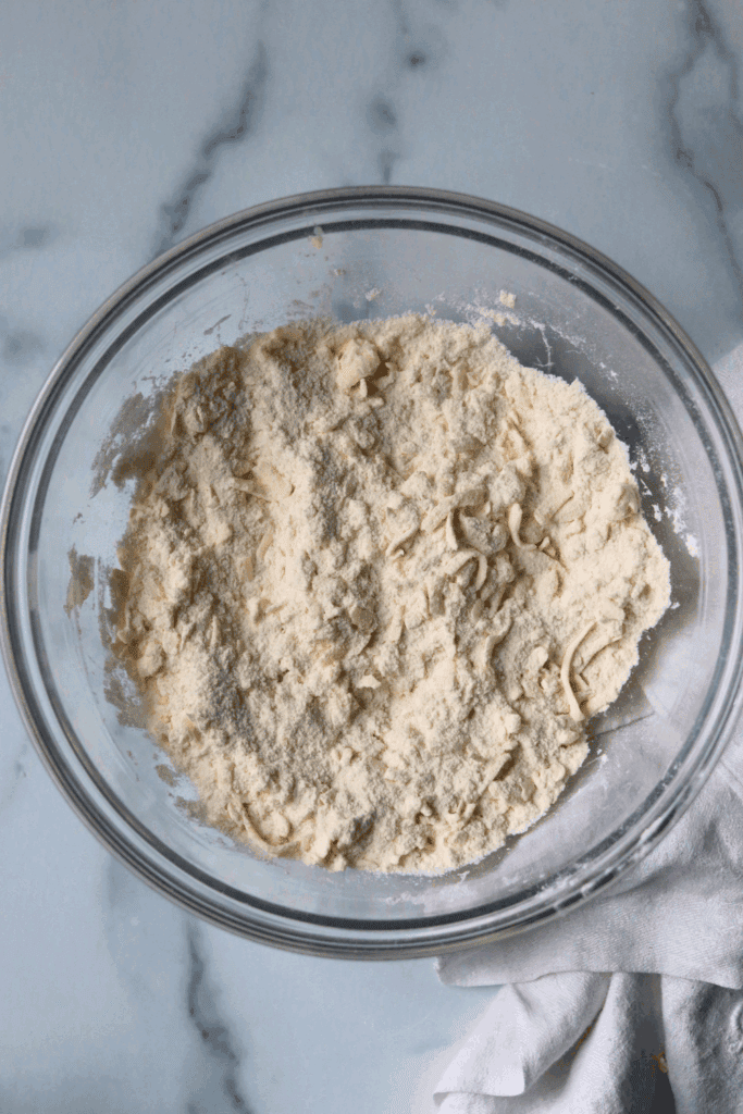 grated cold butter to the dry ingredients