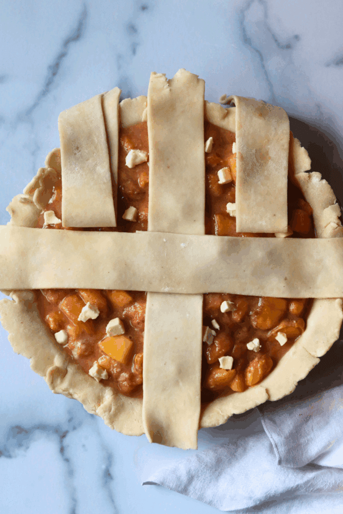 step by step lattice pattern to make sourdough peach pie