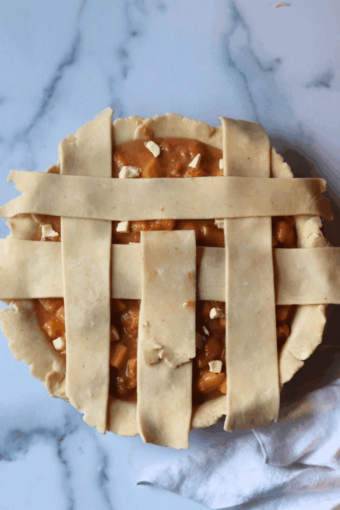 step by step lattice pattern to make sourdough peach pie