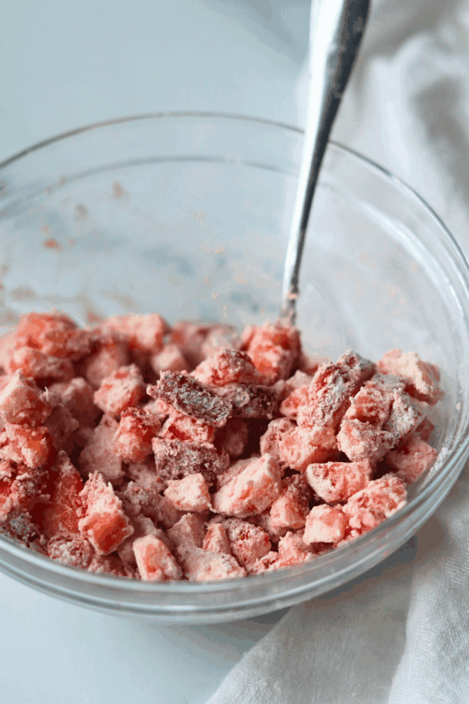 sliced strawberries tossed with flour