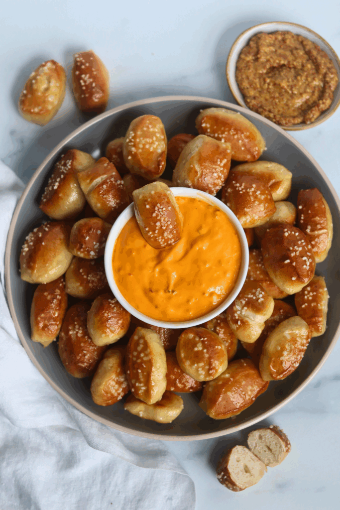 sourdough discard pretzel bites with dip in the middle
