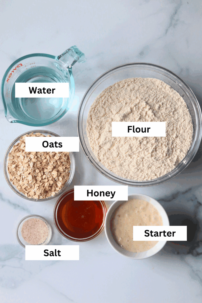 ingredients for making honey oat sourdough bread
