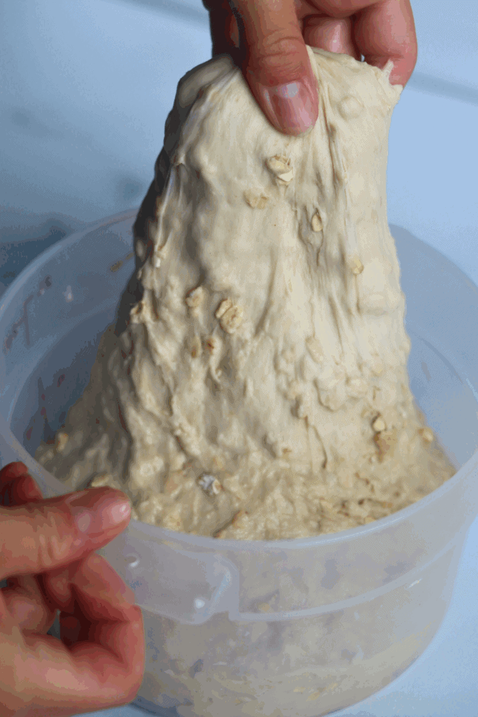 dough being stretched