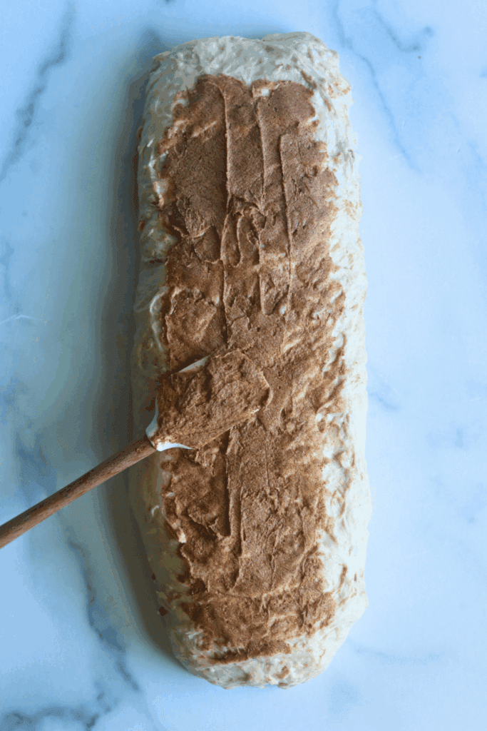 shaping sourdough with cinnamon sugar filling