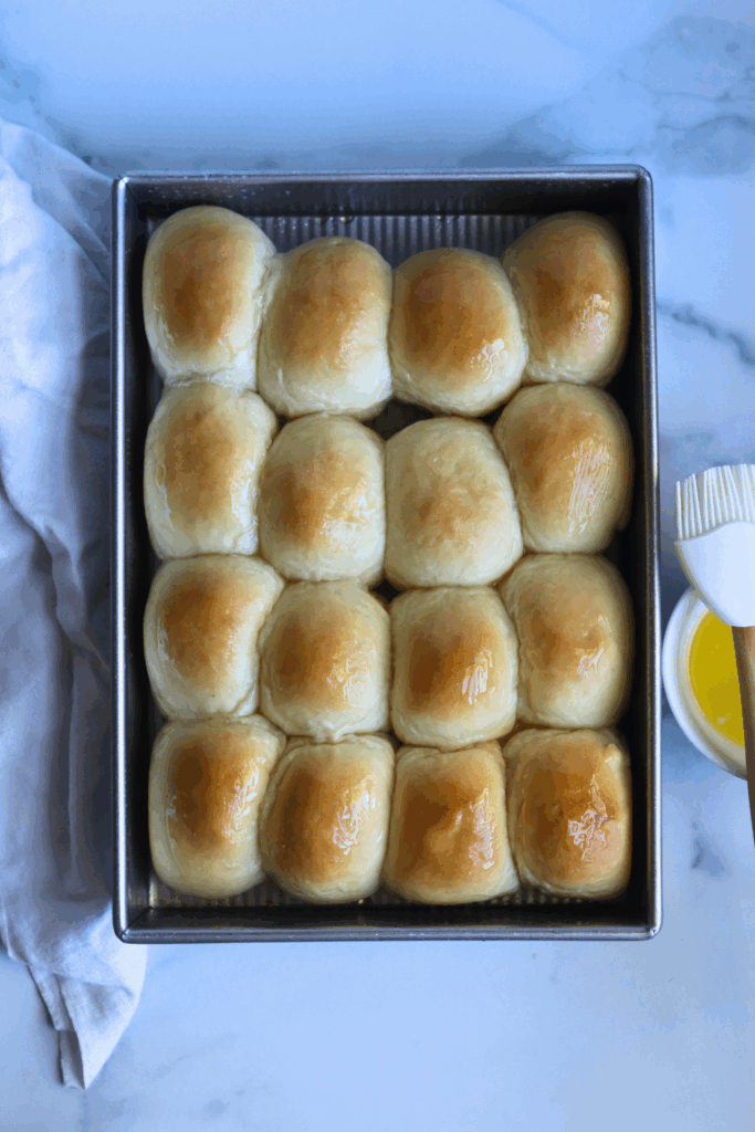 sourdough discard dinner rolls brushed with butter on top