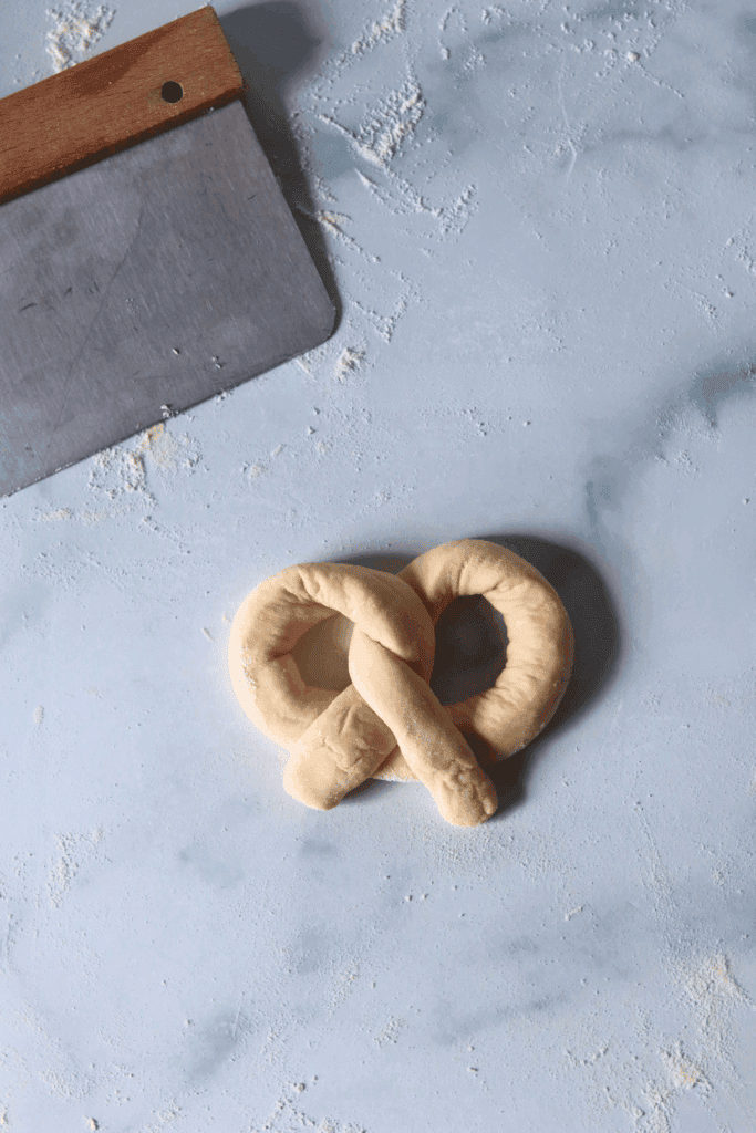 shaping the dough into pretzel