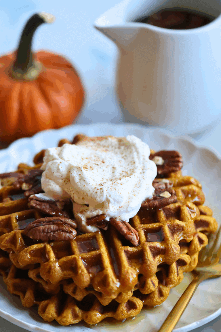 pumpkin waffles topped with pecans