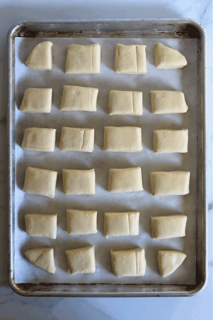 dough pieces on a baking sheet