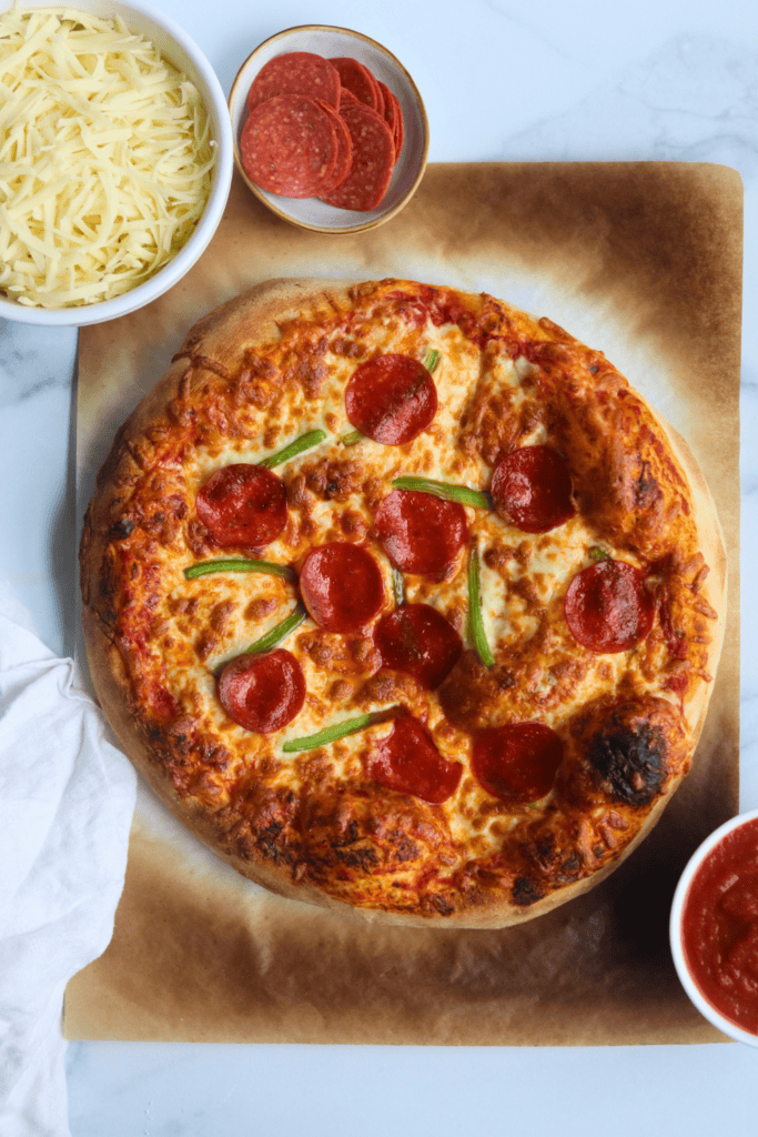 baked pizza using sourdough discard pizza dough