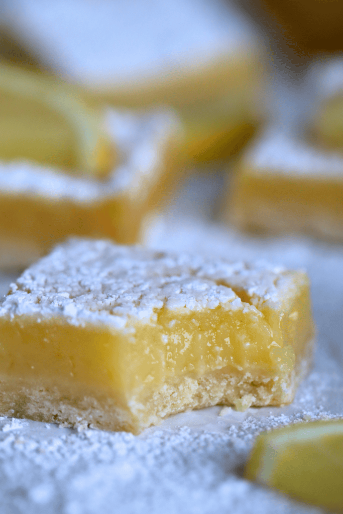 a bite out of a sourdough lemon bar