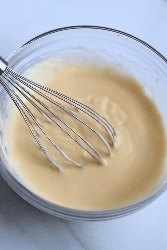 sourdough discard and butter whisked until smooth in a bowl