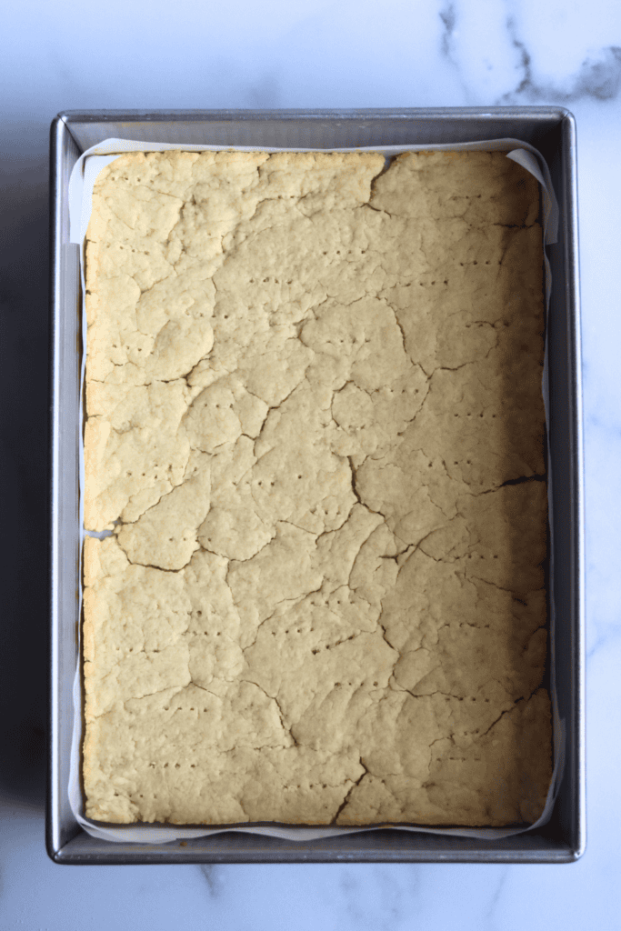 shortbread dough pressed in a baking dish