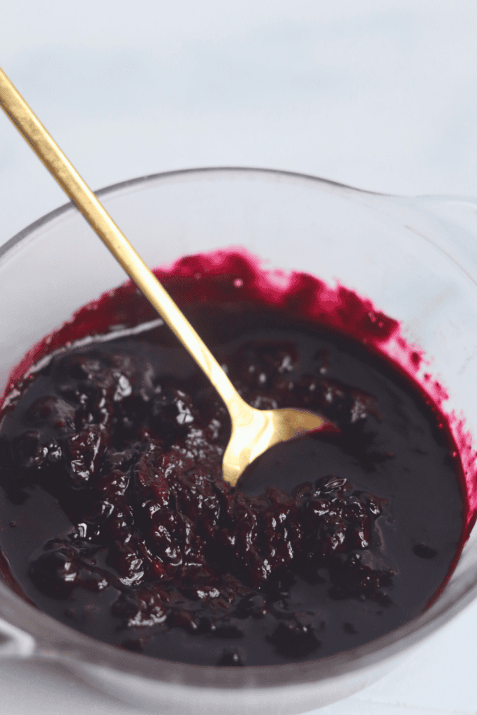 mashed blueberries in a bowl
