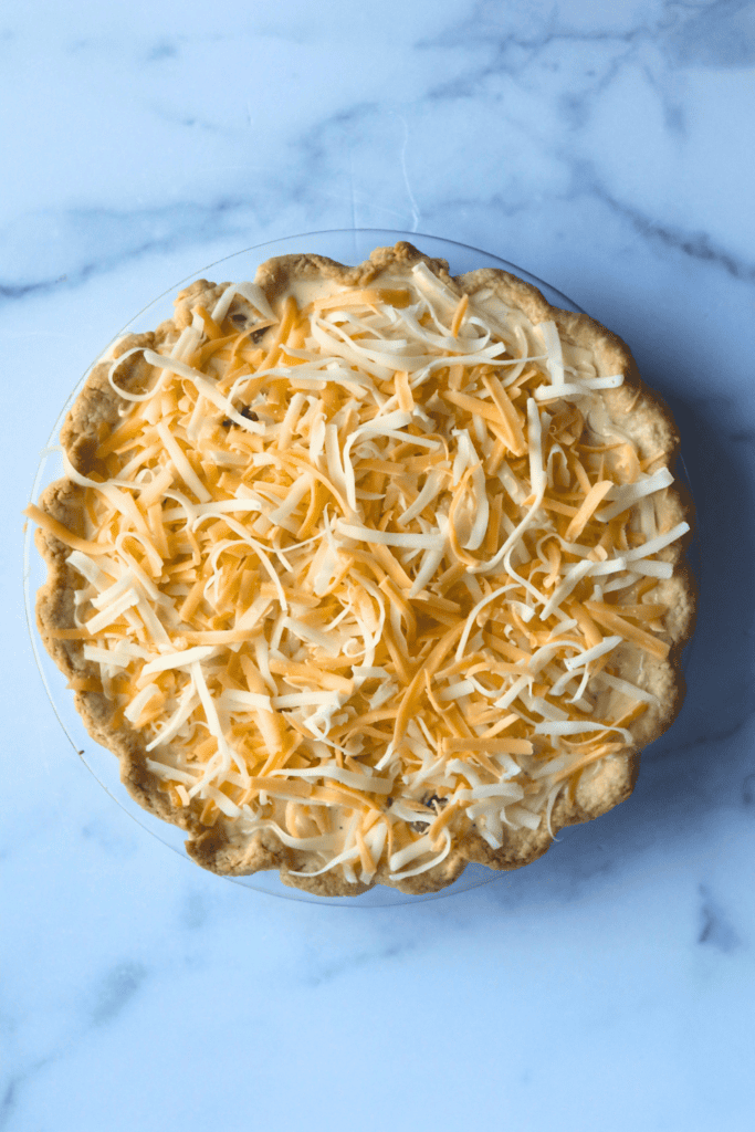 sourdough quiche with shredded cheese