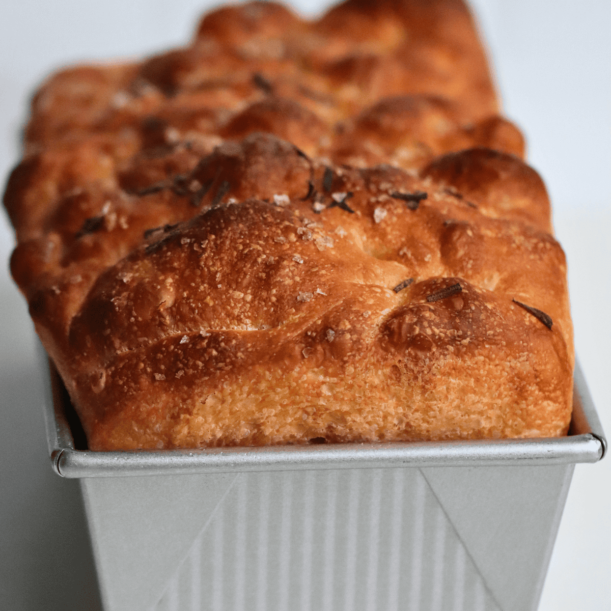 sourdough focaccia baked in a loaf pan