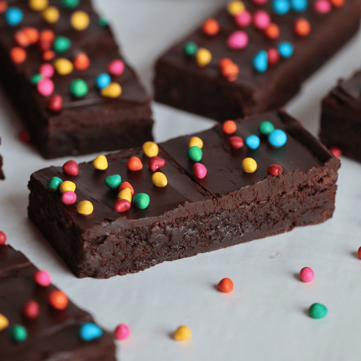 slices of sourdough cosmic brownies with colorful sprinkles