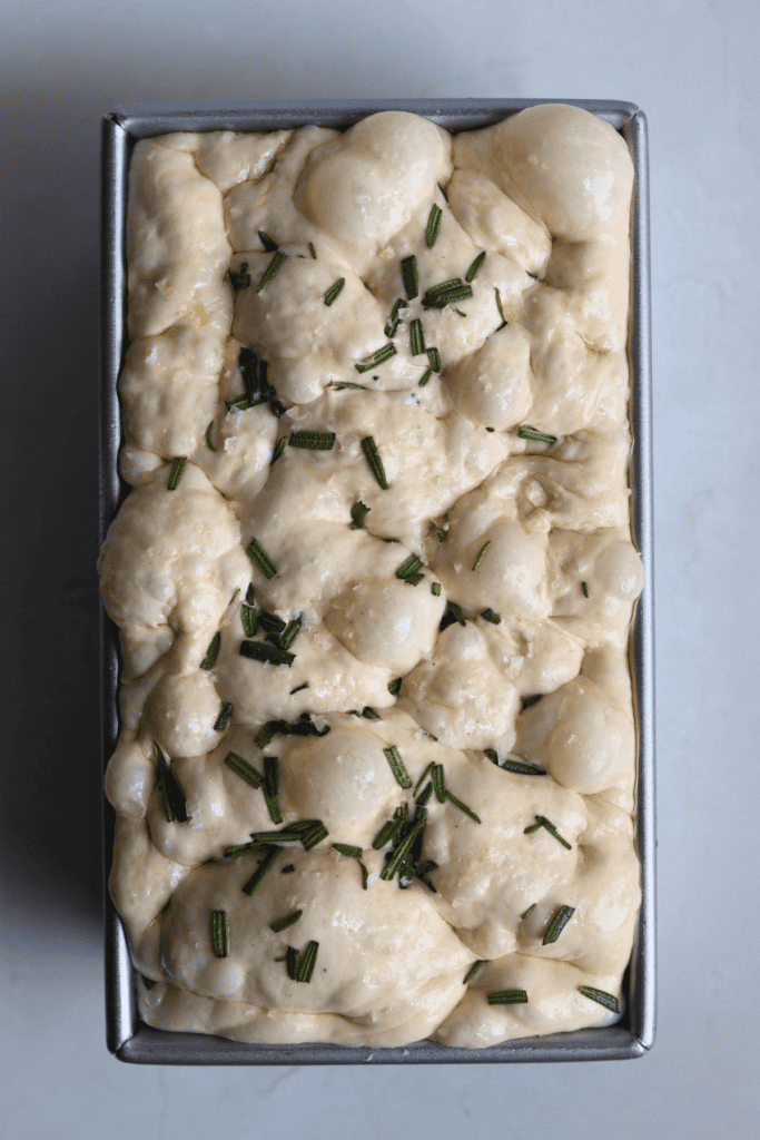 making dimple on the focaccia dough