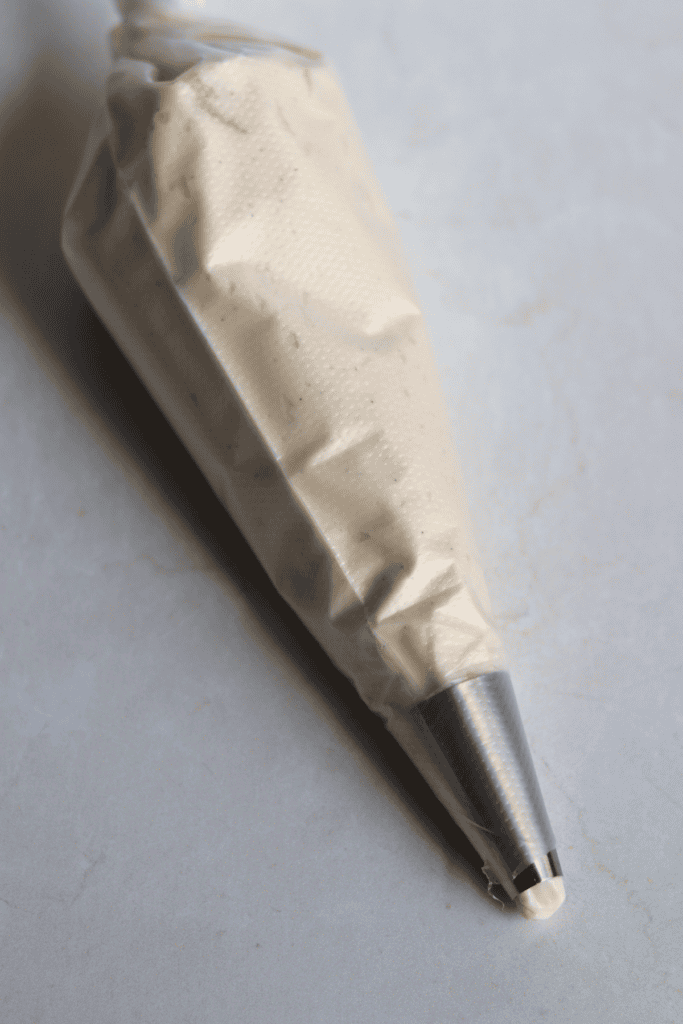 cream cheese filling in a piping bag